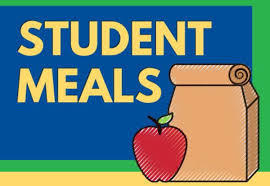 student meals with a bag lunch and apple