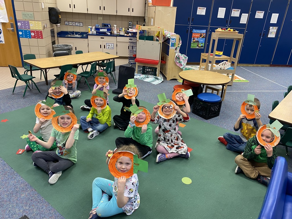 students with leprechaun masks on