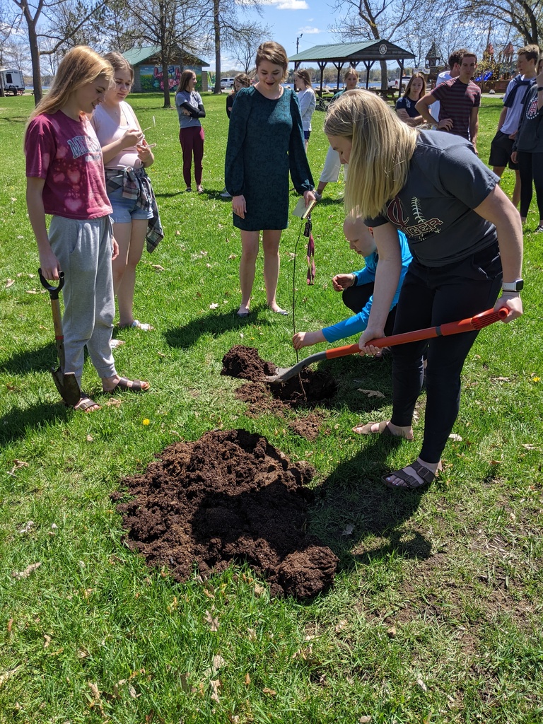 student digging a hole