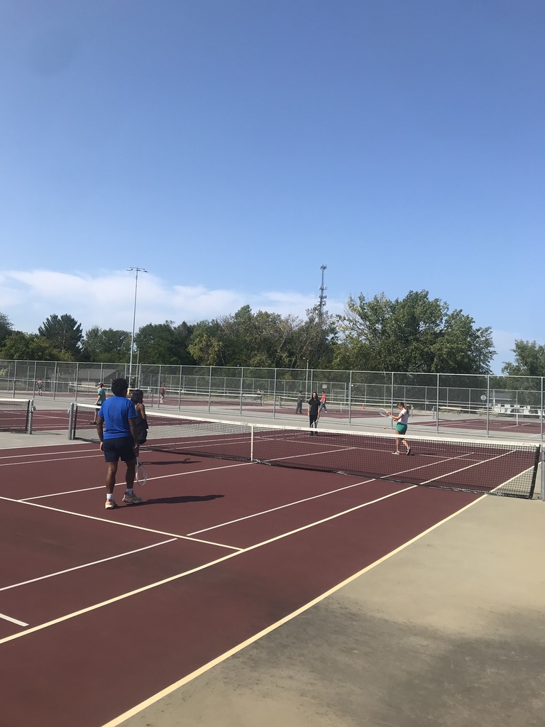 students playing tennis