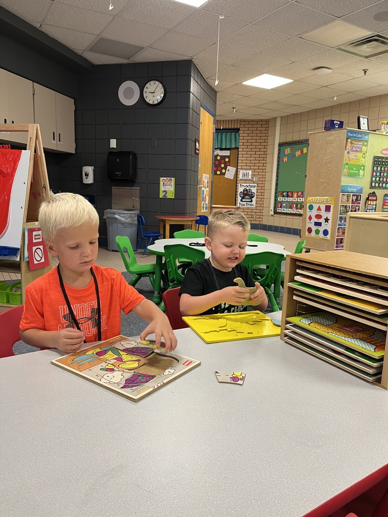 two prek students playing