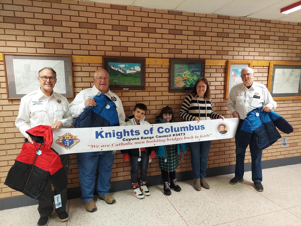 4 adults and 2 students with the knights of columbus