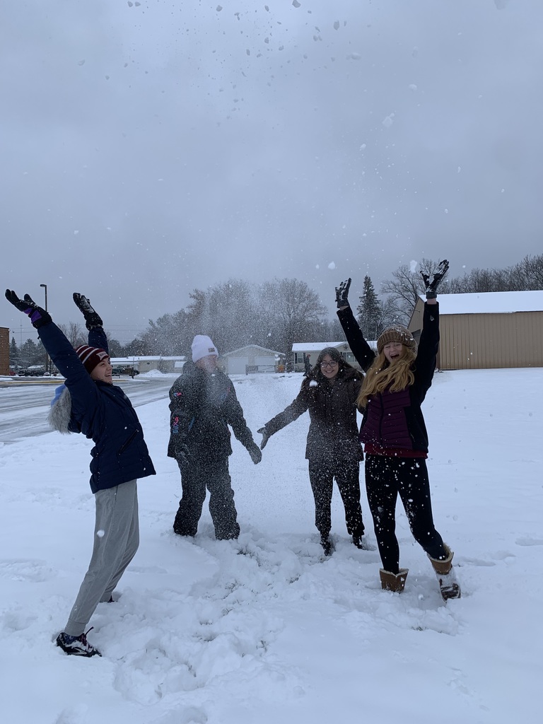 students throwing snow