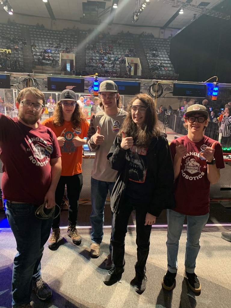 Students giving thumbs up