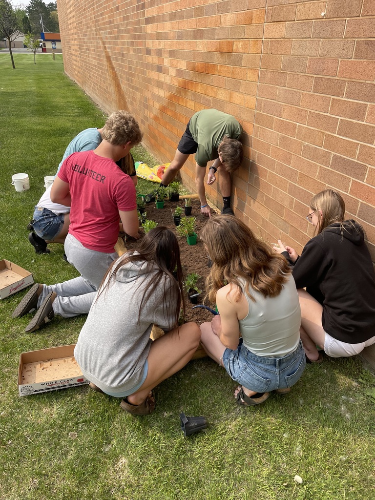 students planting flowers 2
