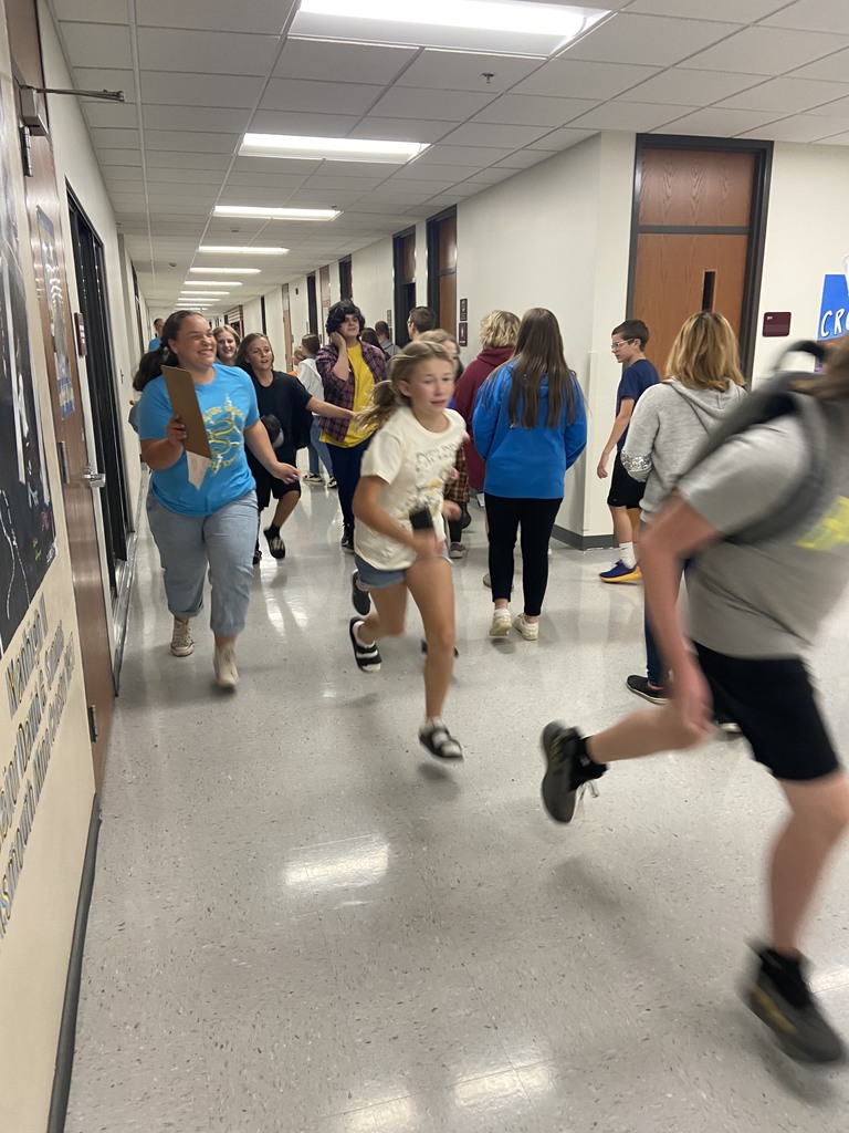 student running/walking in the hallway